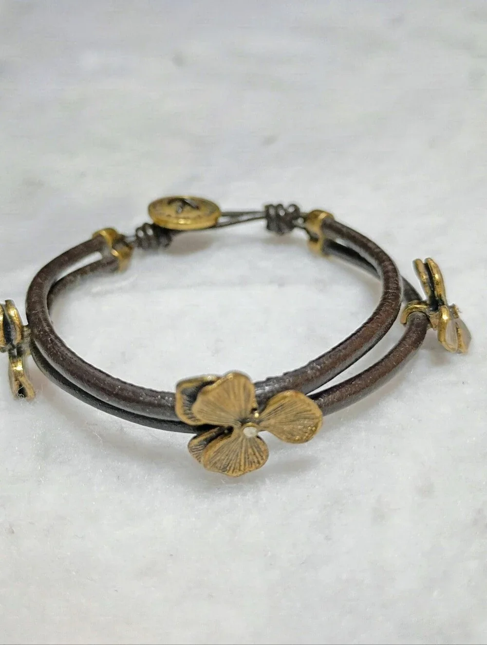 Fossil Flower Leather Bracelet and Flower Necklace